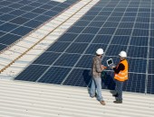Men working on a photovoltaic plant